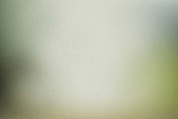 Fototapeta premium Soft green frosted glass texture with gentle diffused light glow