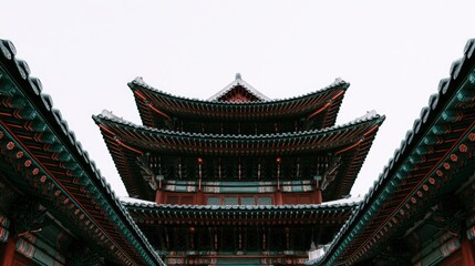 Fototapeta premium Traditional Asian Temple Architecture with Multi-Tiered Roofs and Decorative Details