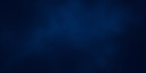 Obraz premium A deep, textured navy blue background, subtly illuminated by soft, diffused light sources creating a gradient of shadow and subtle highlight, evoking a sense of depth and sophistication.