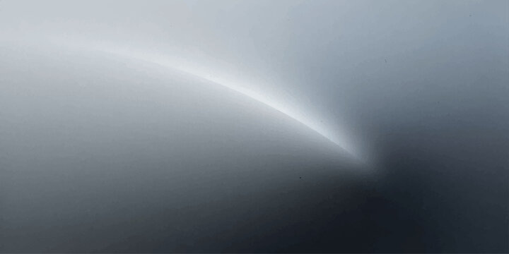 Abstract light effect on a gray background with a curved bright line.