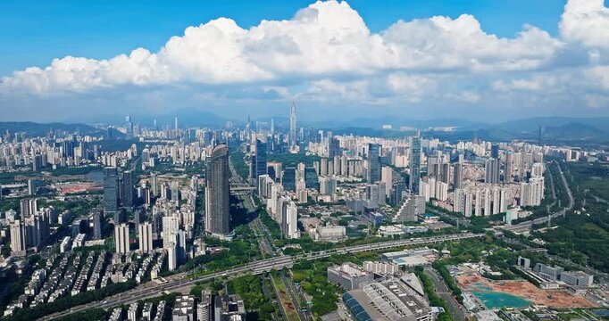 Aerial drone view of modern city skyline and dense skyscrapers in Shenzhen, China