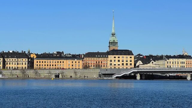 Stockholm skyline in Sweden showcasing Scandinavian architecture and the historic Gamla Stan, featuring medieval buildings, narrow cobblestone streets, and a picturesque cityscape.