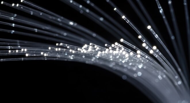 Glowing Fiber Optic Cables on Black Background for Technology Theme