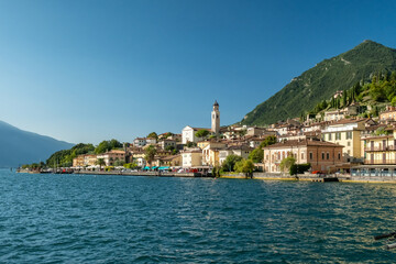 Fototapeta premium Old town harbor and lakefront view, Limone sul Garda, Italy