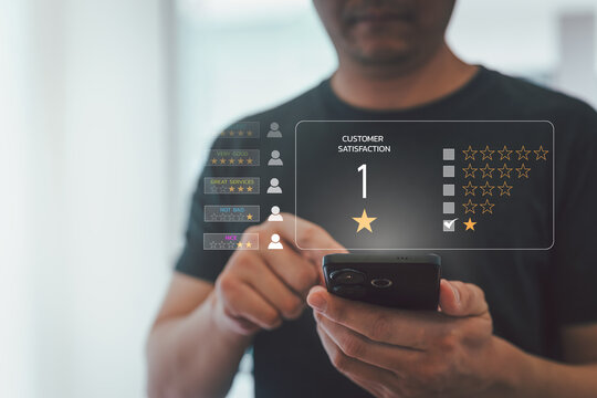 Person touch smartphone to submit 1 star customer satisfaction rating with virtual review interface, negative feedback, poor service, customer complaint, bad experience and reputation management.