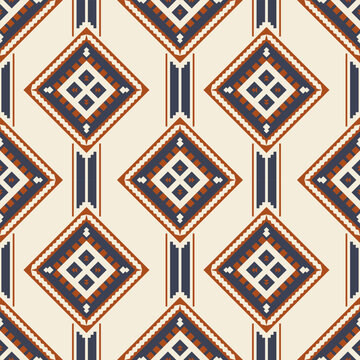 Seamless Southwestern Aztec diamond medallion pattern in rust navy