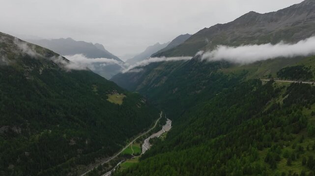 Aerial view of the Timmelsjoch mountain pass on the border of Austria and Italy featuring breathtaking alpine landscapes scenic peaks and travel in Europe