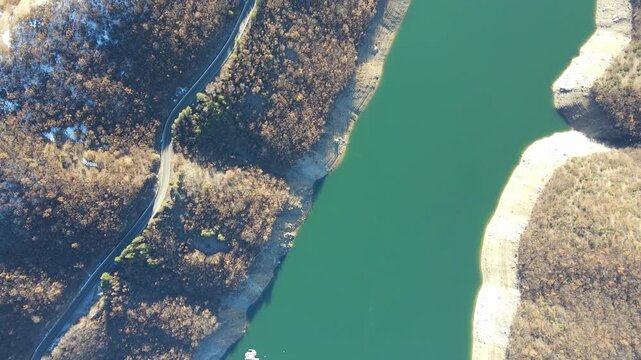 Aerial Winter view of Vacha (Antonivanovtsi) Reservoir, Rhodope Mountains, Plovdiv Region, Bulgaria