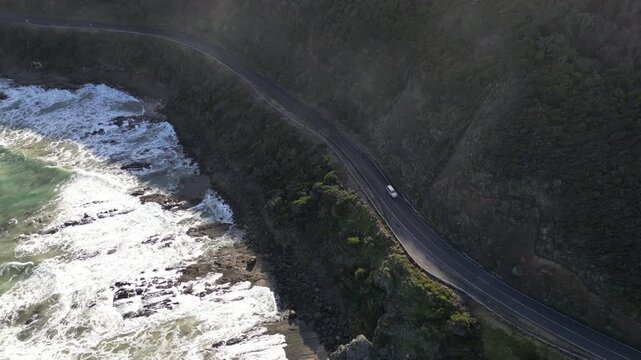 Aerial landscape of Great Ocean Road Victoria Australia showcasing rugged hills mountain scenery and spectacular ocean coastline views