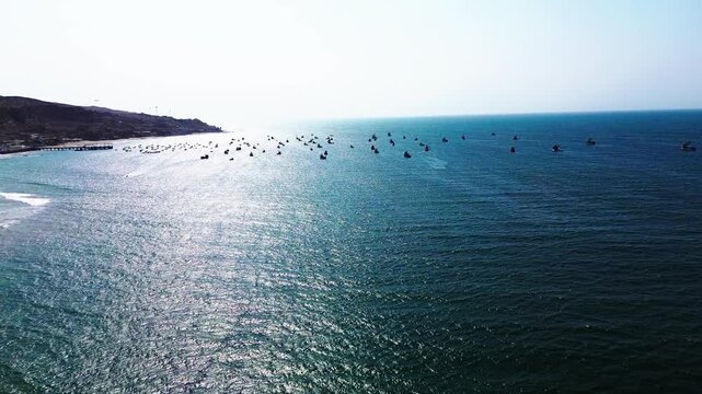Aerial View of Fishing Boats on Pacific Ocean in Ecuador, Blue Water, Coastal Horizon, Artisanal Fleet and Tropical South American Seascape