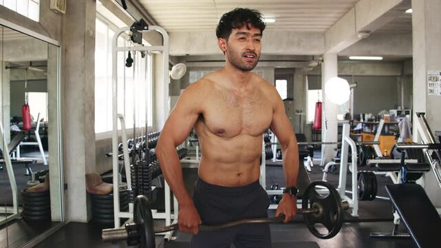 Athlete Performing Upright Row with Barbell