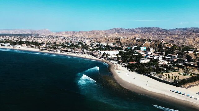 Aerial View of Ecuador Coastal Town with Sandy Beach, Ocean Waves, Dry Hills and Urban Buildings, Tropical South American Seascape Landscape