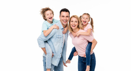 Obraz premium Beautiful picture of family happiness showing mother, father, daughter, and son smiling together in a studio portrait.