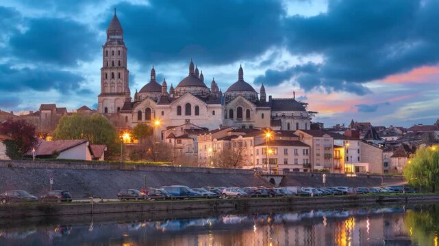 Perigueux, France - view of Cathedral at dusk reflecting in Isle river  (static image with animated sky and water) 