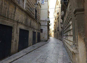Fototapeta premium Lecce narrow street stone buildings architecture historic alley