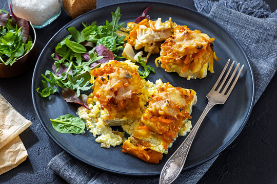 Cheesy Veggie Baked White Fish on a plate