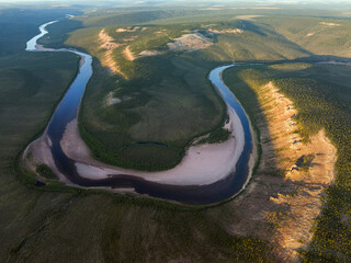 Aerial View of Winding River in Green Landscape © abul lais