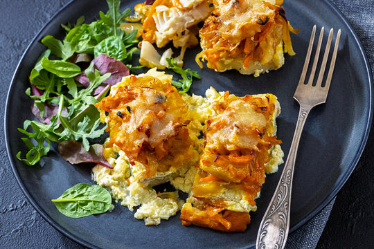 Cheesy Veggie Baked White Fish on a plate