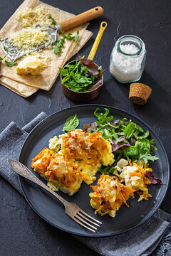 Cheesy Veggie Baked White Fish on a plate