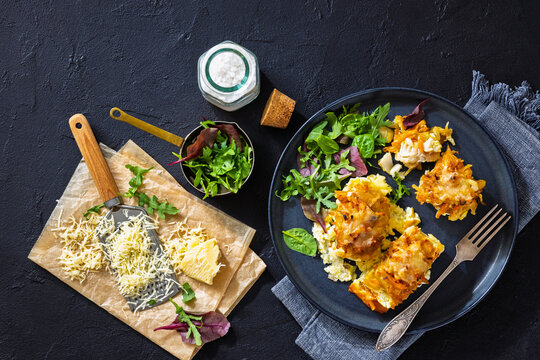 Cheesy Veggie Baked White Fish on a plate