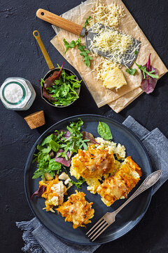 Cheesy Veggie Baked White Fish on a plate