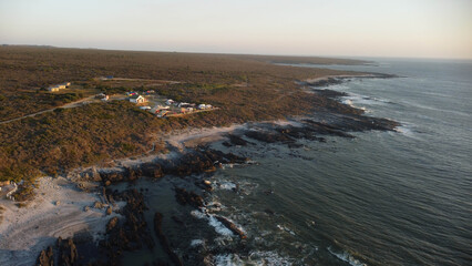 Aerial view of  Ganzekraal Coastal Resort is a popular, tranquil seaside getaway located right on the Atlantic Ocean with tidal pool and campsites. © Fearless on 4 Wheels