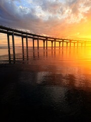 Obraz premium impressive huge bridge in the sunset sea horizon, fantastic sea horizon