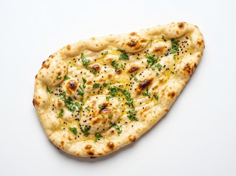 Freshly baked Indian garlic naan bread garnished with chopped cilantro and black sesame seeds on a plain white studio background, bright clean food photography for commercial culinary menus.