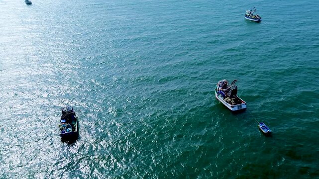 Aerial View of Fishing Boats on Blue Ocean Near Ecuador Coast, Calm Pacific Water, Artisanal Fishing Fleet and Tropical Maritime Travel Scene