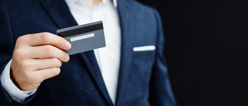 Businessman Holding Credit Card for Corporate Payment and Finance