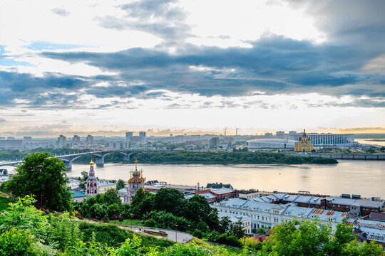 A sunset view of Nizhny Novgorod, including the confluence of the Oka and Volga rivers.