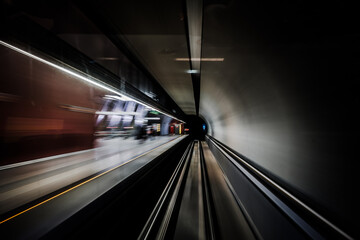 Abstract motion blur of a subway train moving through a tunnel © Agnes