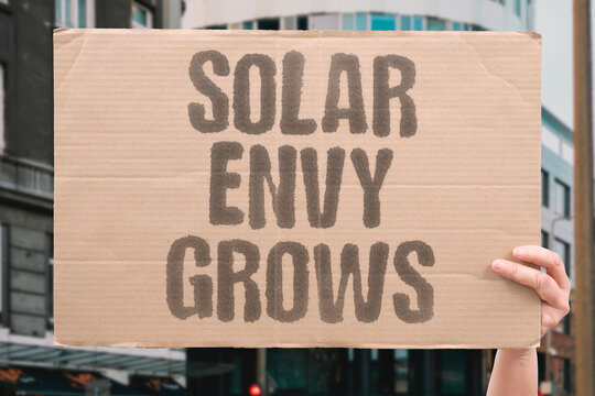 "Solar envy grows" Seeing panels on roofs inspires change. INSPIRES, CHANGE, PANELS, SOLAR, ENVY.