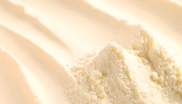 Close-up of powdered sugar dusting on surface.
