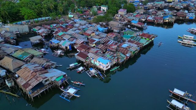 Coron Palawan stilt houses built settlement over water. Lovely aerial view drone