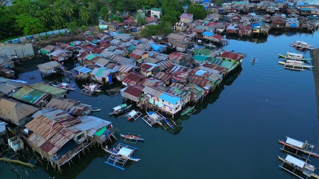 Coron Palawan stilt houses built settlement over water. Unique aerial view drone
