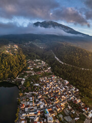 Obraz premium Sarangan Lake and Lawu Mountain from above