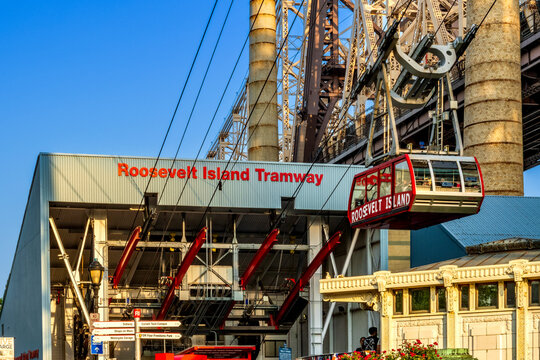 New York, NY - US - Jul 1, 2026 The Roosevelt Island Tramway links Manhattan&rsquo;s Upper East Side to Roosevelt Island, its red POMA cabins gliding 3,140 feet above the East River.