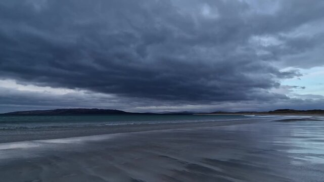 Dramatic clouds at Narin Strand by Portnoo, County Donegal in Ireland.