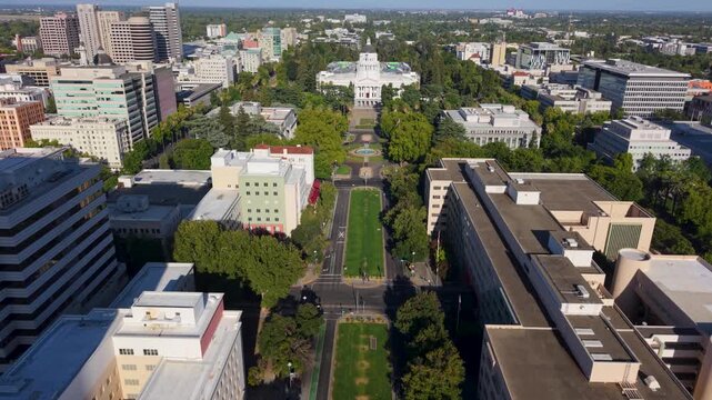 This shows aerial views of the west side of the California State Capitol with the new annex construction on the east side.