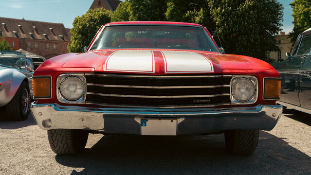 Berlin, Germany - May 3, 2026. Red Chevrolet El Camino front view at oldtimer show.