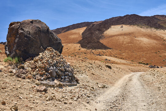 Trail past a volcanic lava bomb