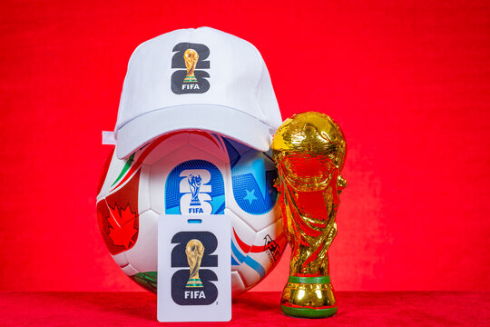 ZHONGSHAN China-July 18 2025: 2026 World Cup work card and soccer and hat and World Cup Trophy model at horizontal.