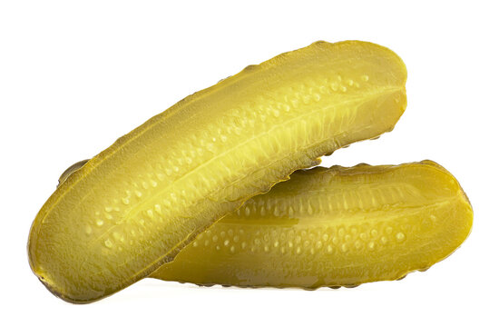 Fresh gherkins - tasty pickled cucumber slices isolated on a white background.