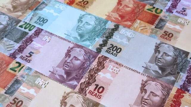 Brazilian paper money, real banknotes as currency for exchange or travel. Brazilian money as a business background