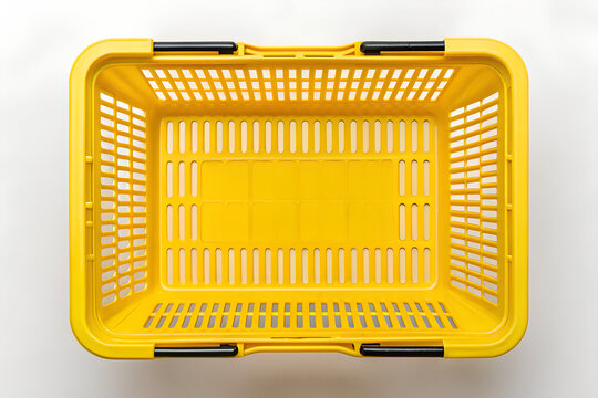 Overhead view of a vibrant yellow plastic shopping basket on png, shopping basket, yellobasket, plastic basket, store basket, supermarket basket, shopping container, retail, grocery, market, container
