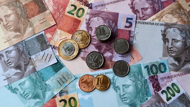 Brazilian paper money, real banknotes as currency for exchange or travel. Brazilian money as a business background