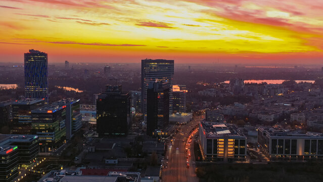 Bucharest city skyline with corporate buildings at sunset