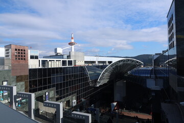 Fototapeta premium Modern architecture of Kyoto Station with glass structure and grand staircase, Kyoto, Japan