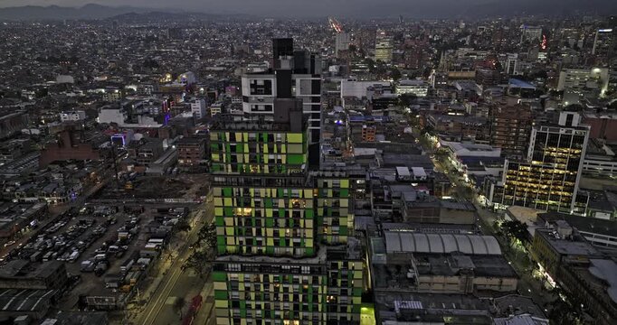 Bogota Colombia Aerial v22 drone flyover Chapinero and Barrios Unidos neighborhoods along Avenida Caracas capturing street traffics and night cityscape at dusk - Shot with Mavic 3 Cine - November 2022